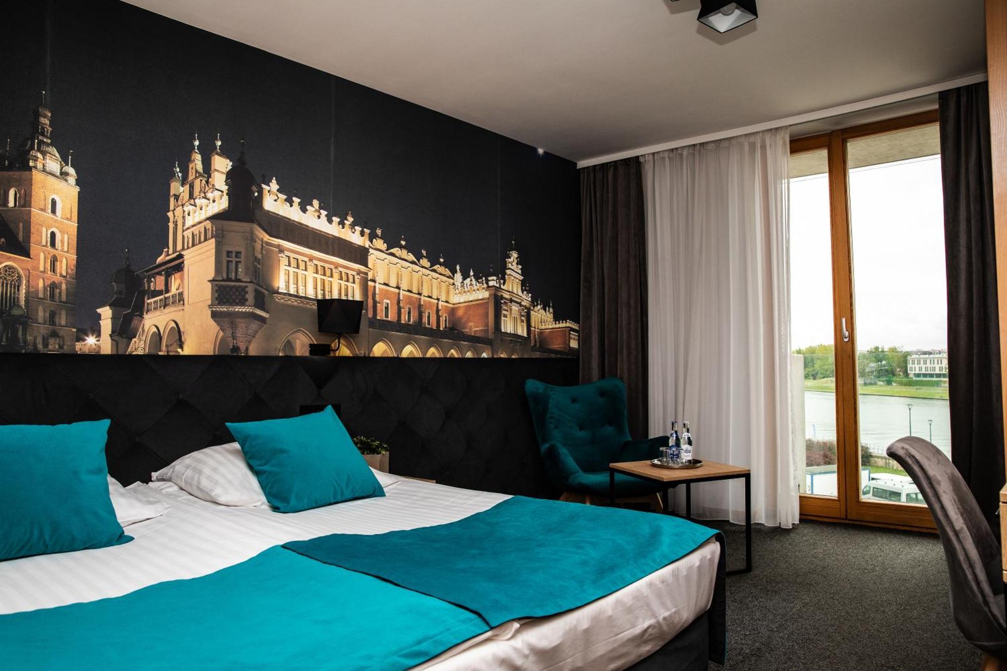 Deluxe Tweepersoonskamer met 2 Aparte Bedden en Uitzicht op de Rivier