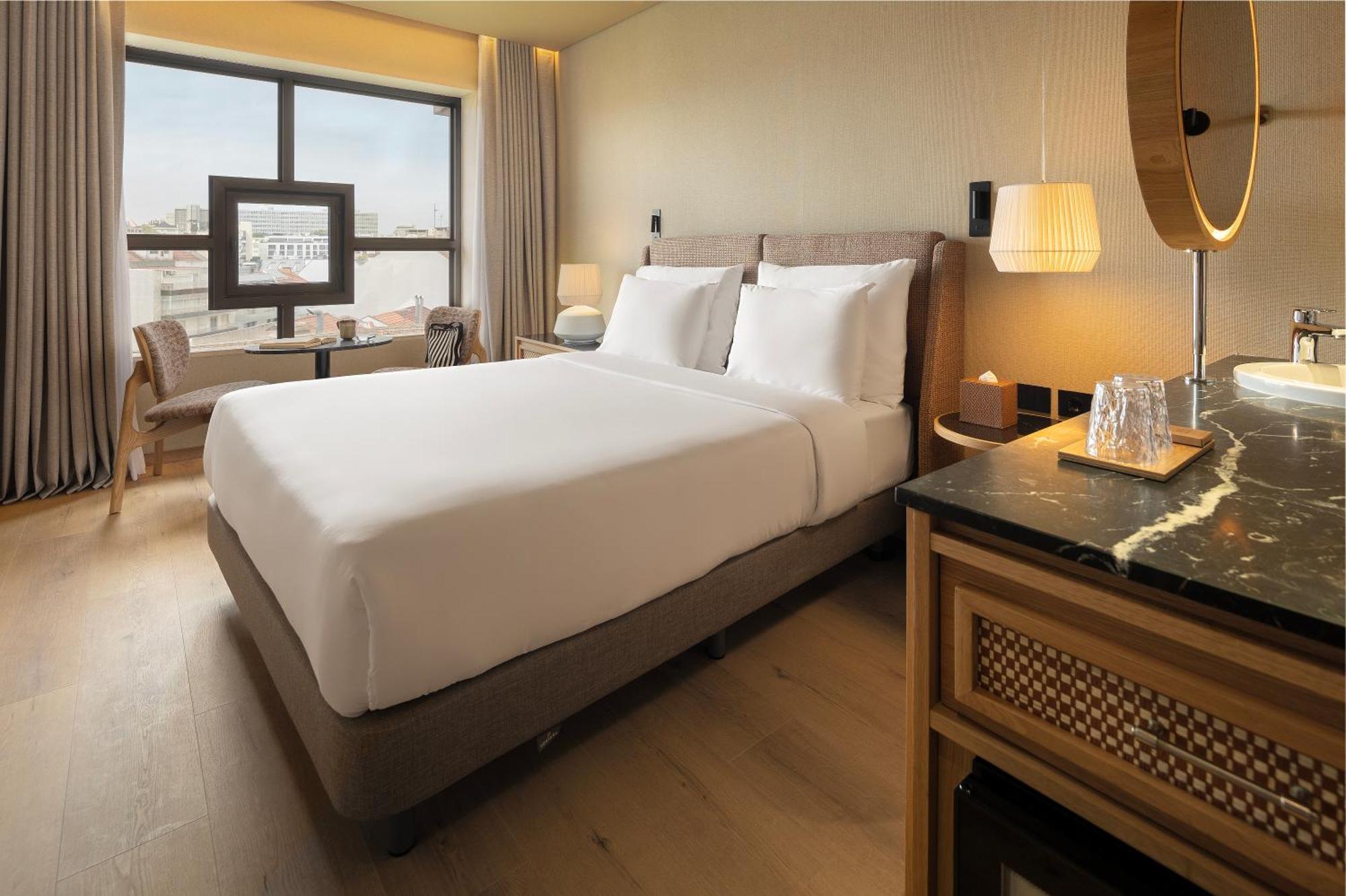 Quarto Deluxe com Cama de Casal ou 2 de Solteiro