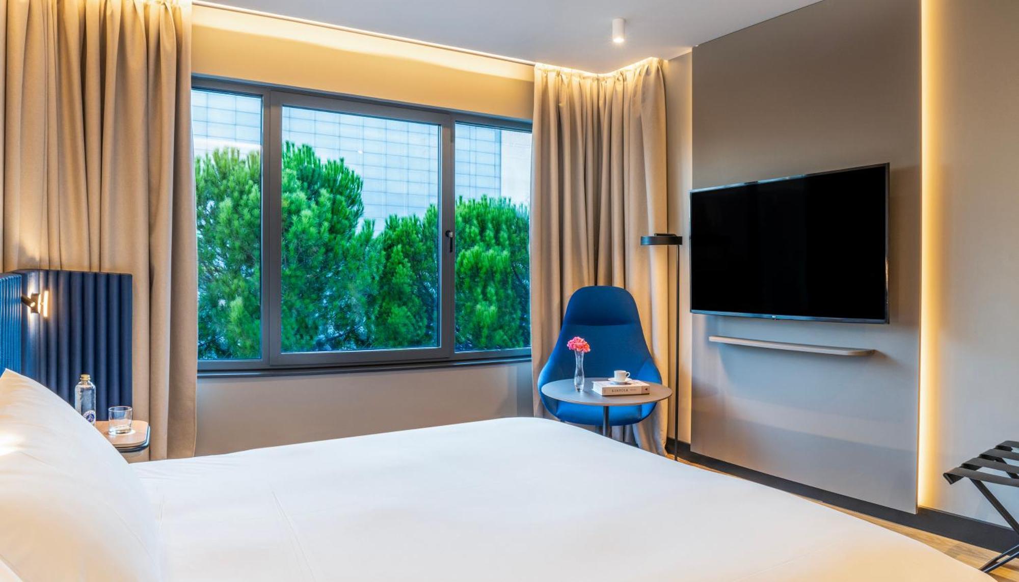 Executive Kamer met Tweepersoonsbed en Bank