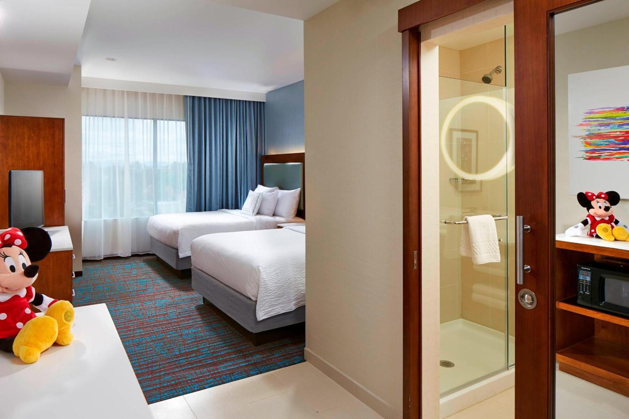 Queen Suite Two Queen Beds Roll Shower Sofa Bed Mobility Access or Hearing Accessible