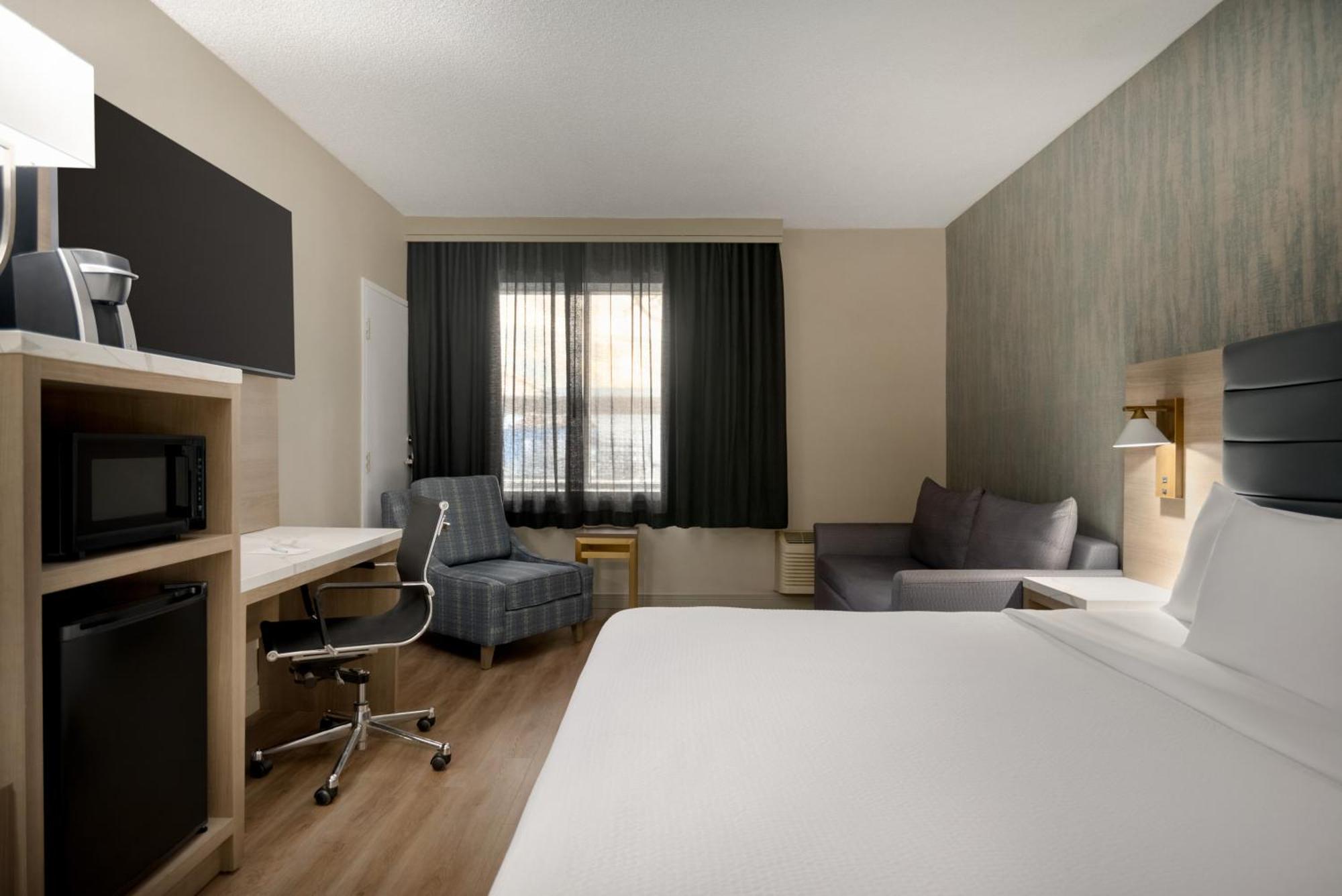 Chambre Lit King-Size avec Réfrigérateur - Non-Fumeurs