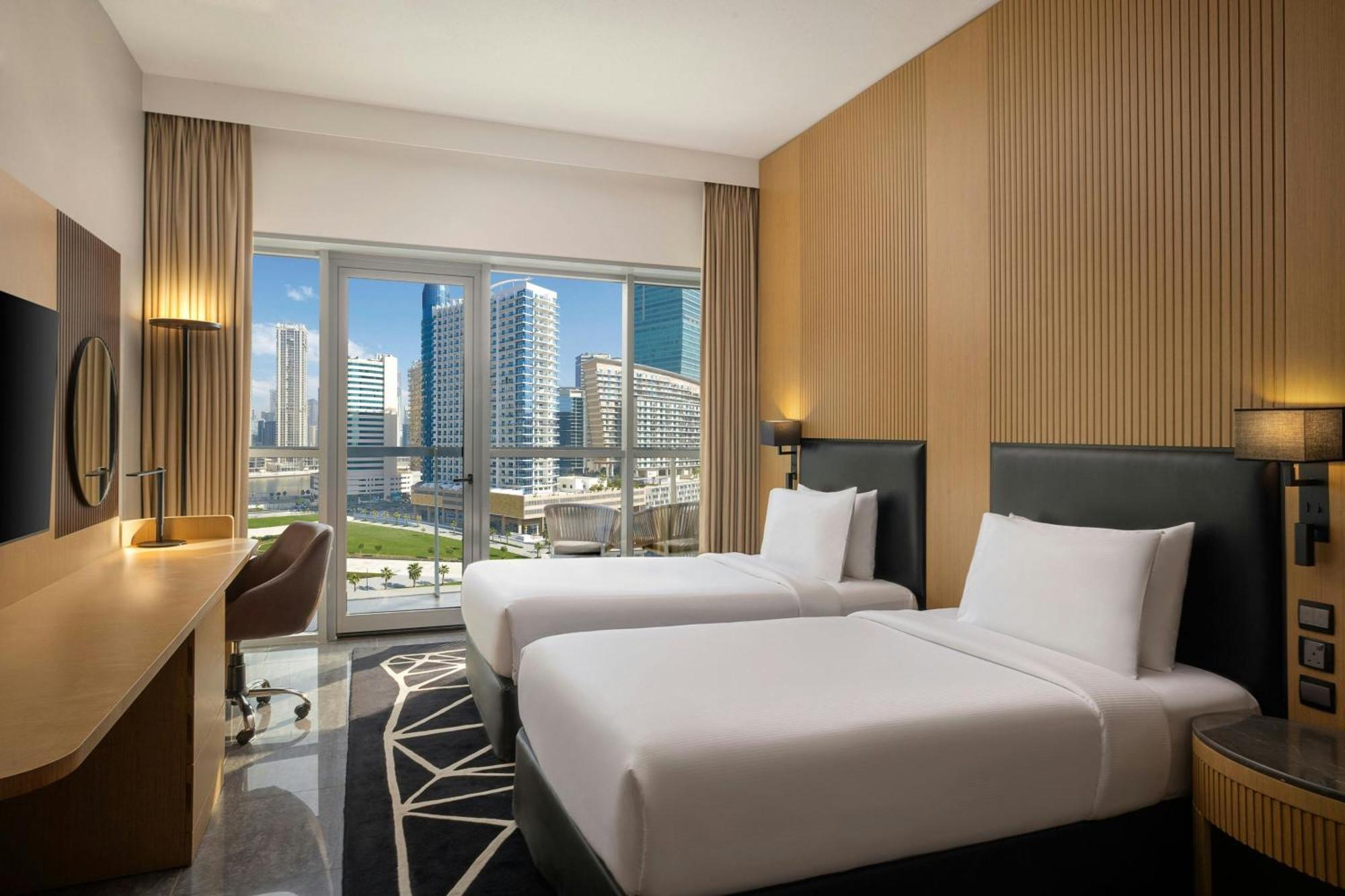 Quarto Twin Deluxe com Varanda e Vista Cidade