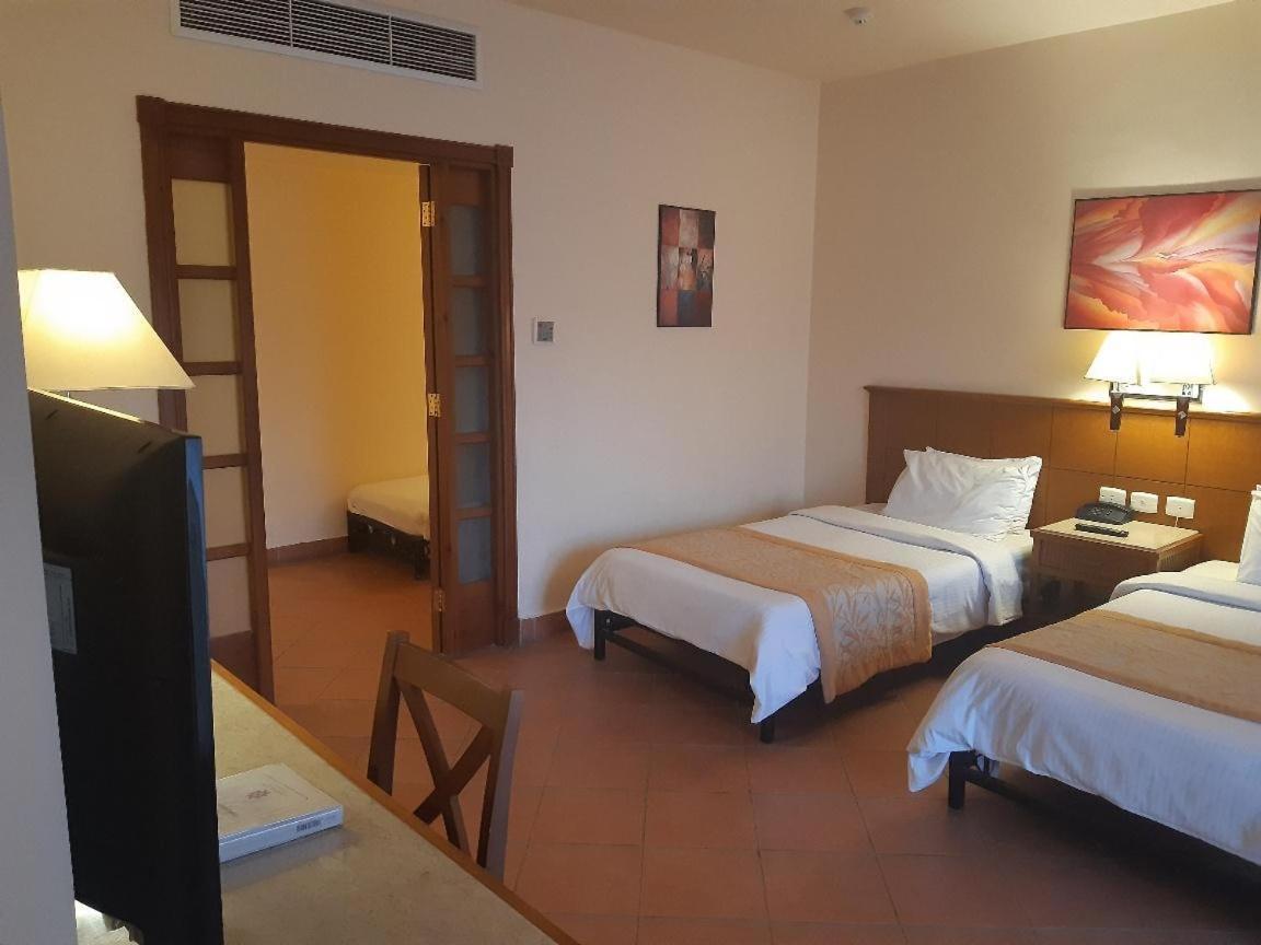 Camera Familiare con Vista Giardino (2 Adulti + 1 Bambino)