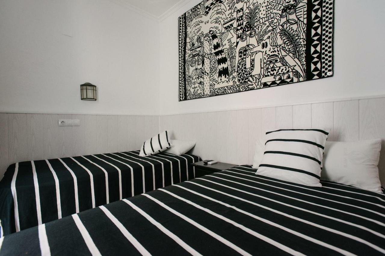 Quarto Twin com Casa de Banho Partilhada